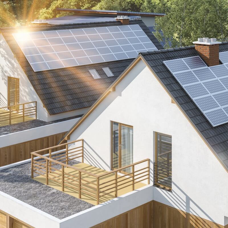 Dachy nowoczesnych domów z panelami fotowoltaicznymi